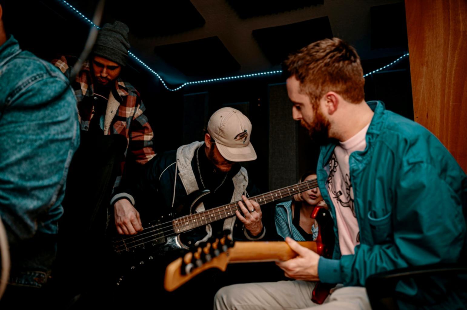 Music production workspace with professional audio equipment and mixing console